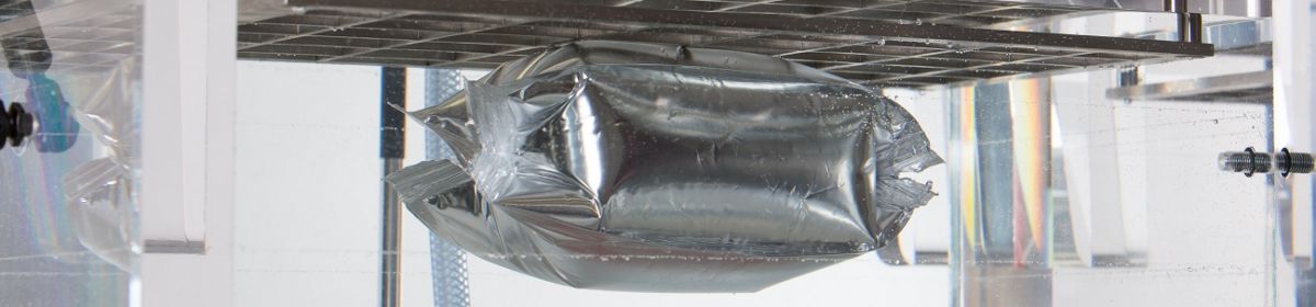 QTA in Aktion Aufgeblähte Verpackung während eines Prüfungsdurchgangs im QTA